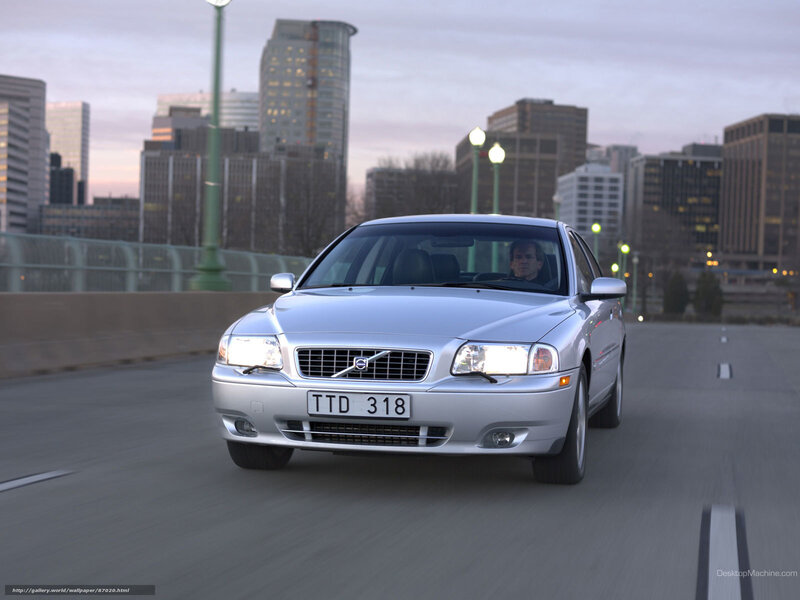 silver volvo on city bridge