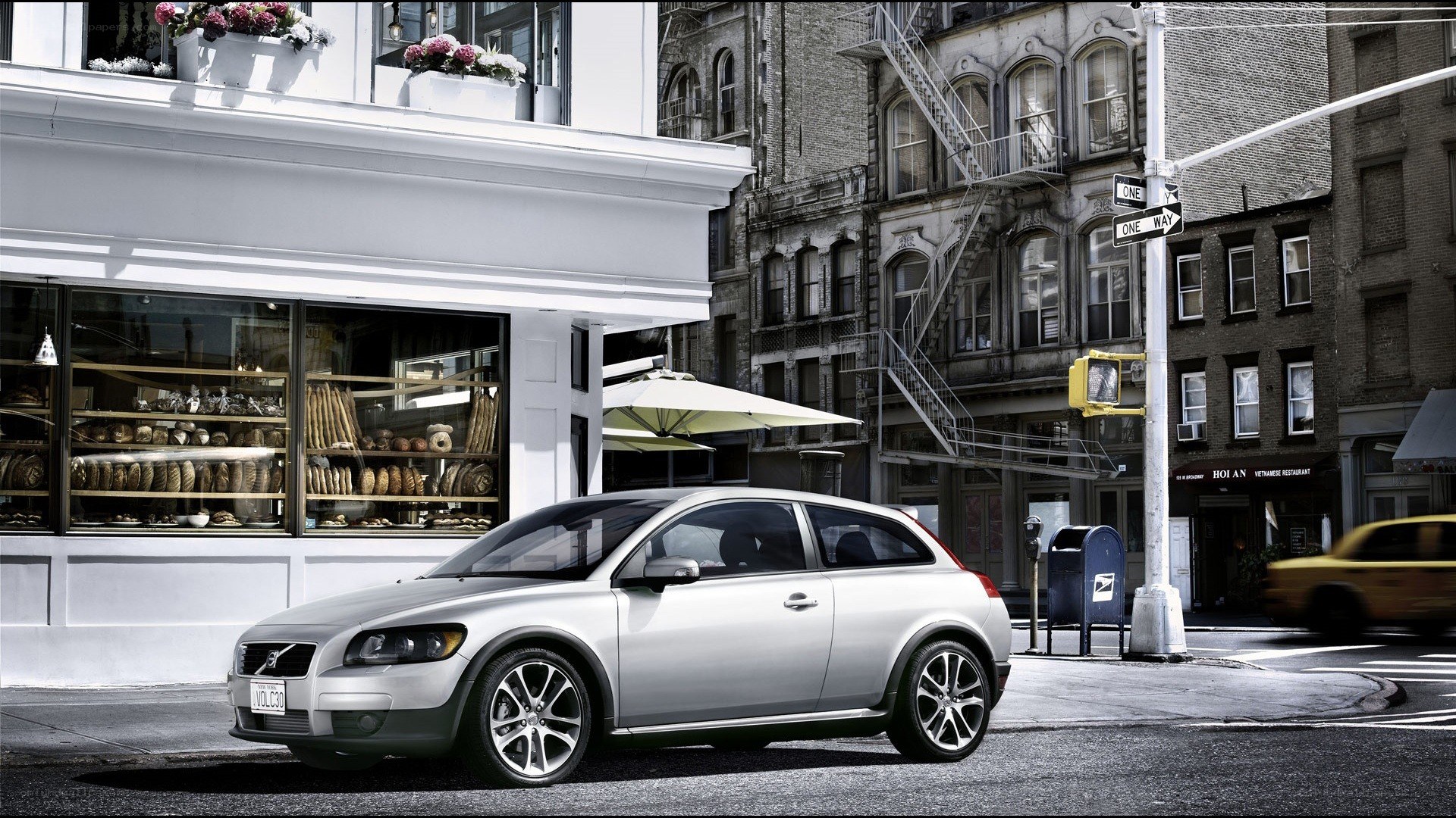 Silver Volvo on city street