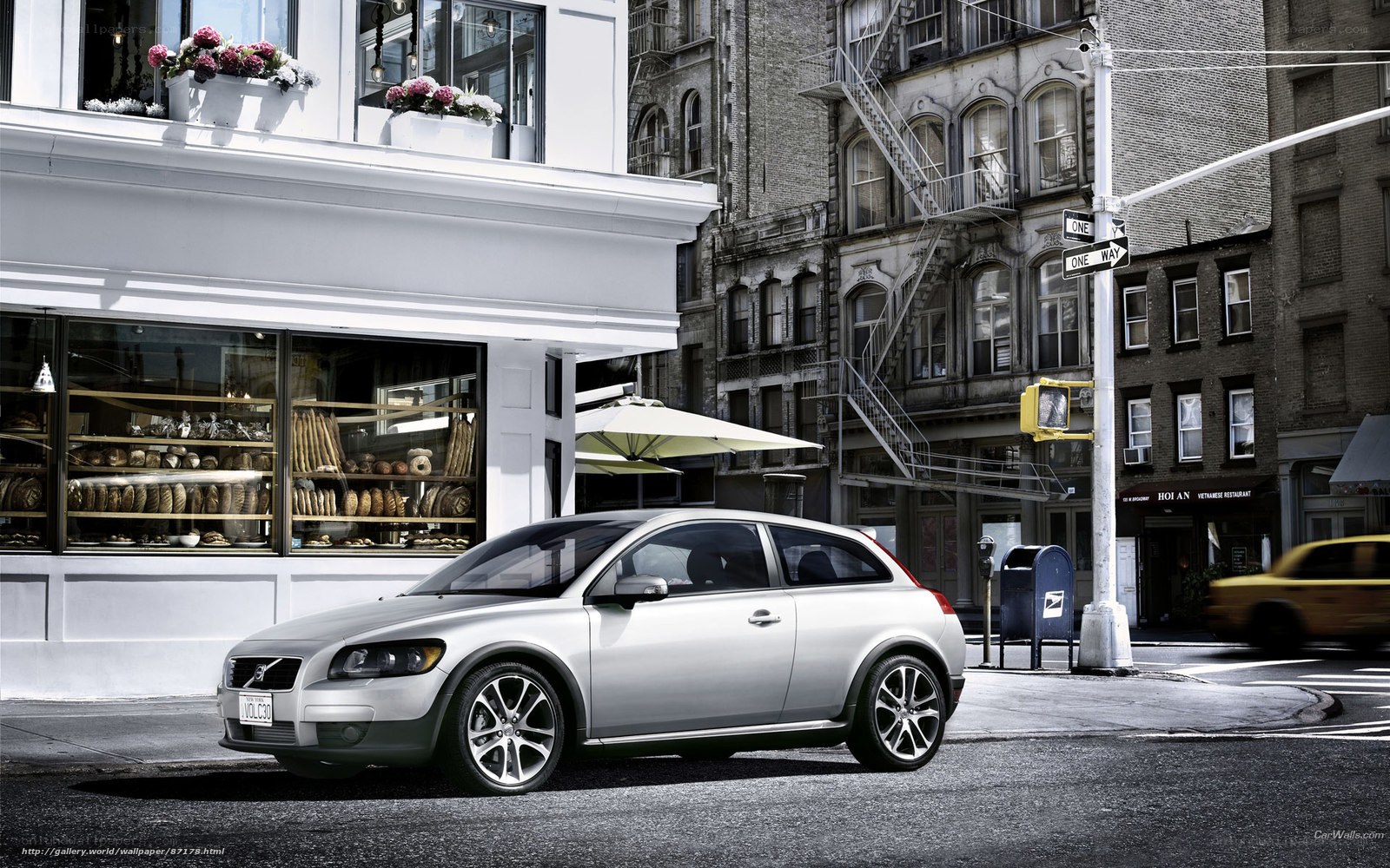 Silver Volvo on city street