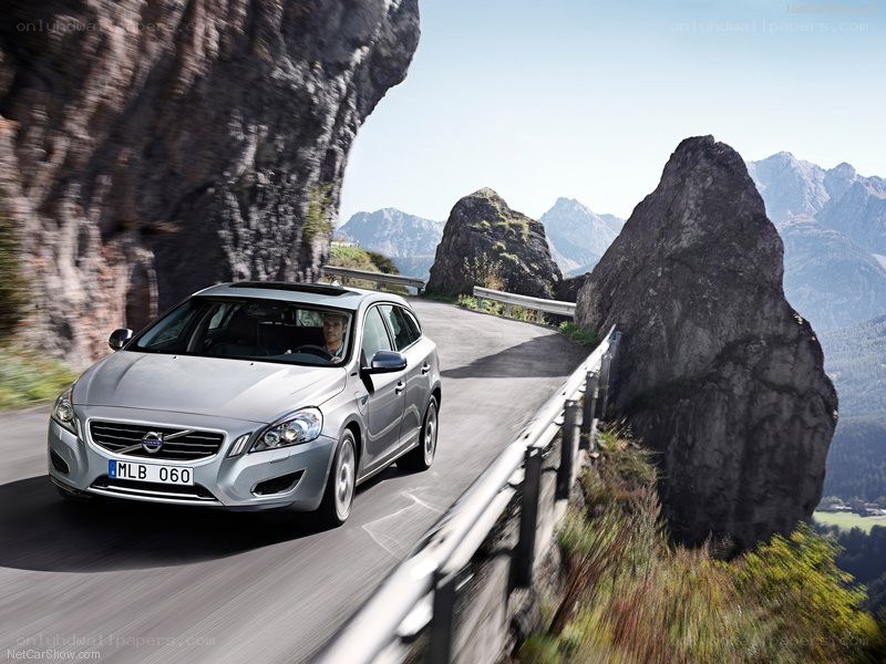 Silver Volvo on mountain road