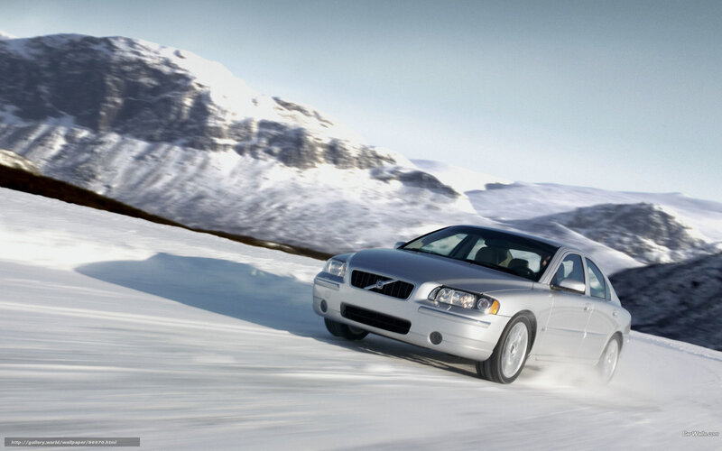 silver volvo on snowy road