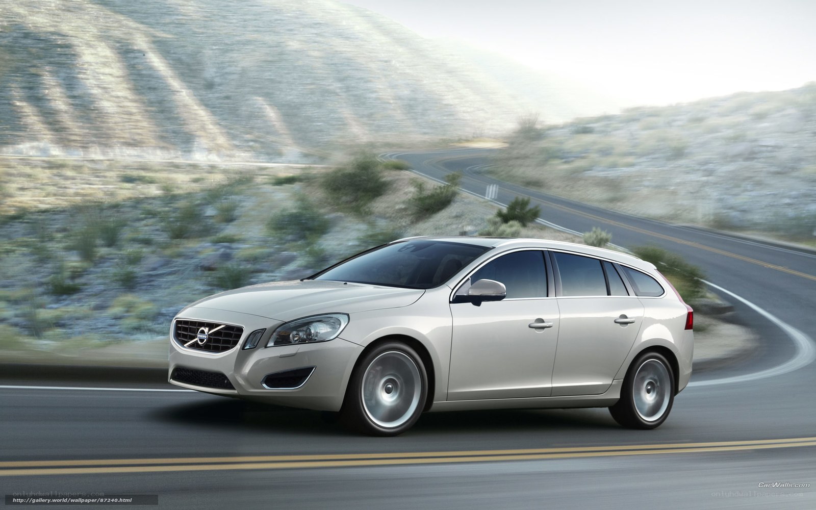 Silver Volvo on winding road