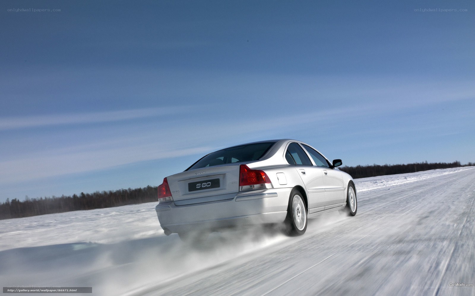 silver volvo s60 on snowy road
