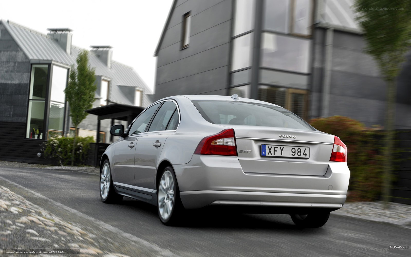 Silver Volvo S80 driving
