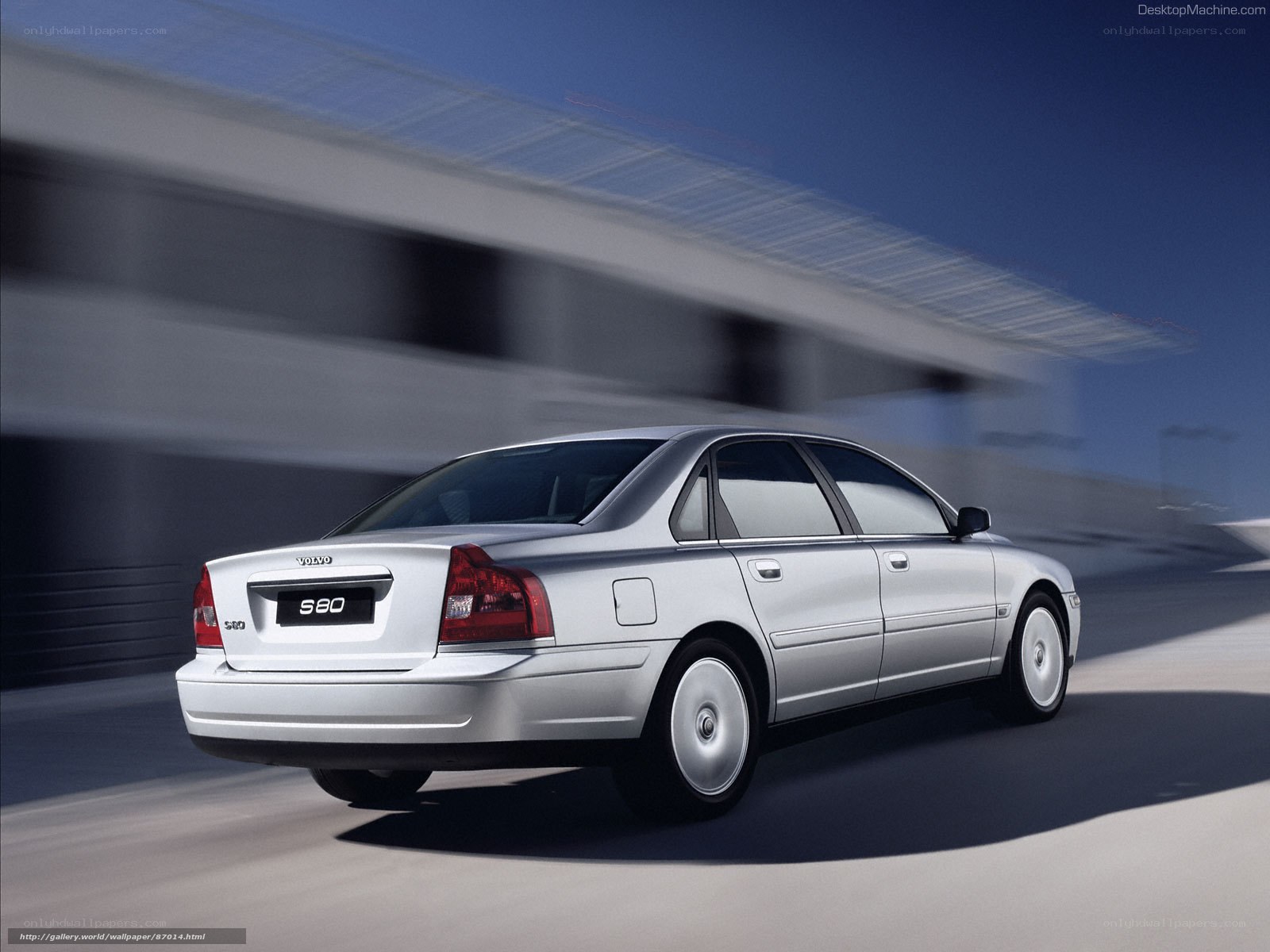 silver volvo s80 in motion