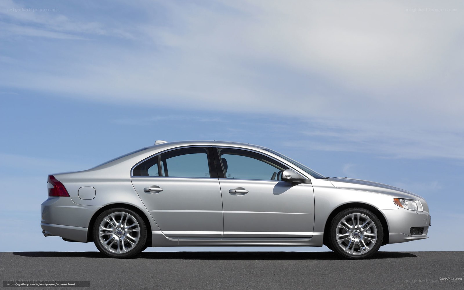 silver volvo sedan side view