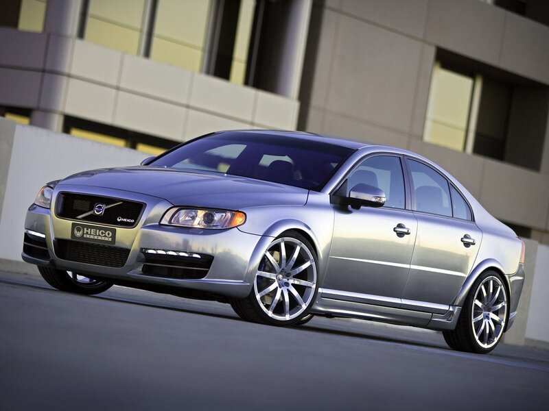 silver volvo sedan with custom wheels