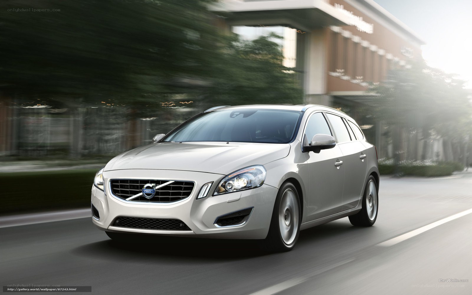 silver volvo v60 in motion