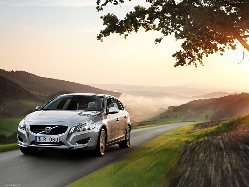 Silver Volvo V60 on a scenic road