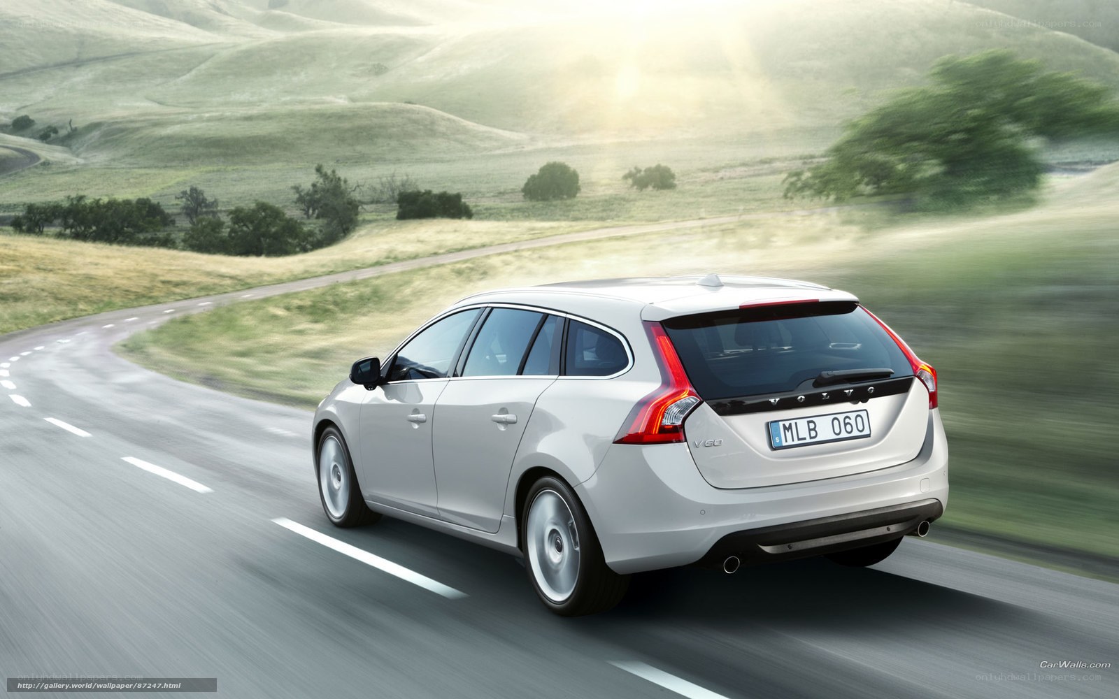 silver volvo v60 on country road