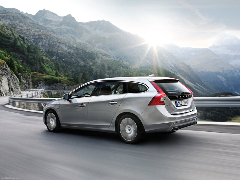 silver volvo v60 on mountain road