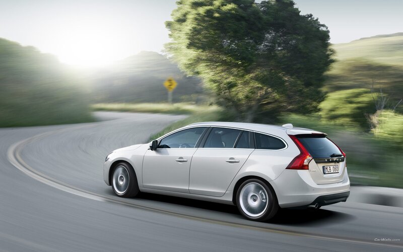 silver volvo v60 on winding road