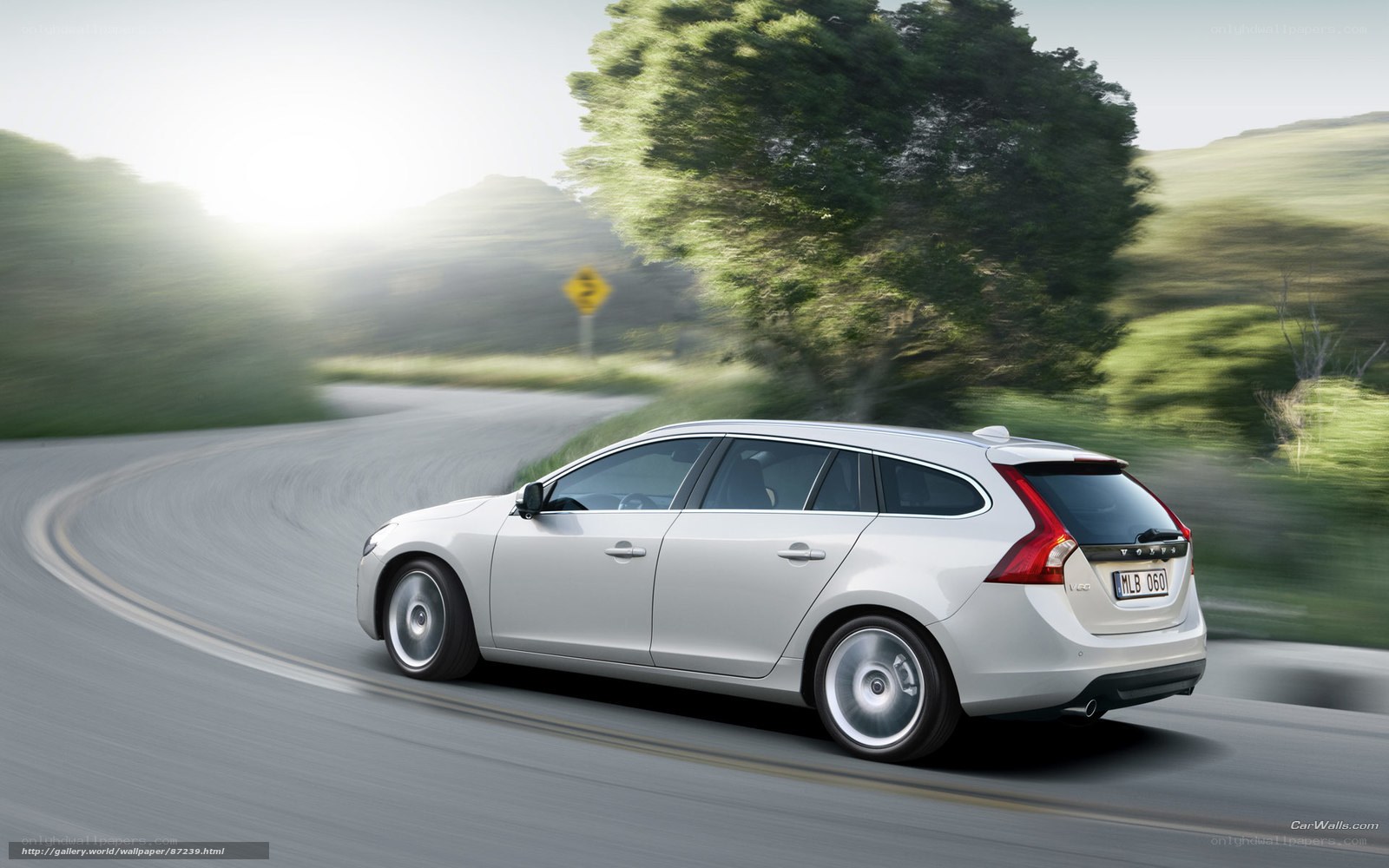 silver volvo v60 on winding road