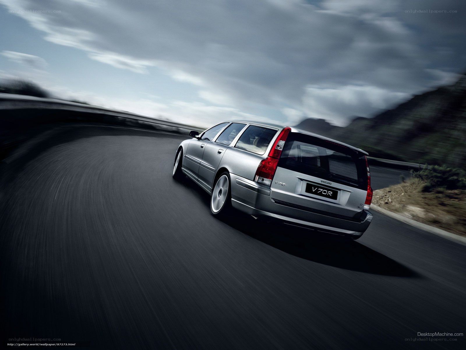 silver volvo v70r in motion