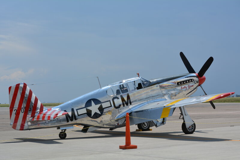Silver Warplane on Tarmac — Calm