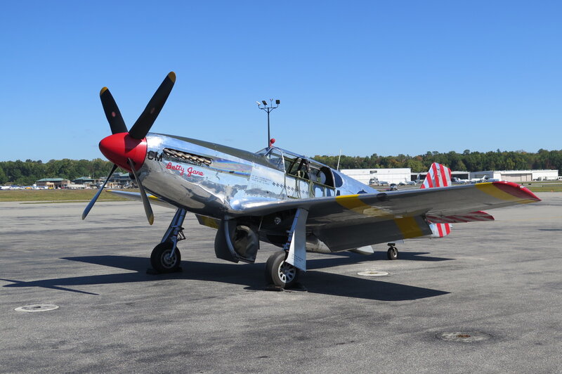 Silver Warplane on Tarmac — Gray, Calm