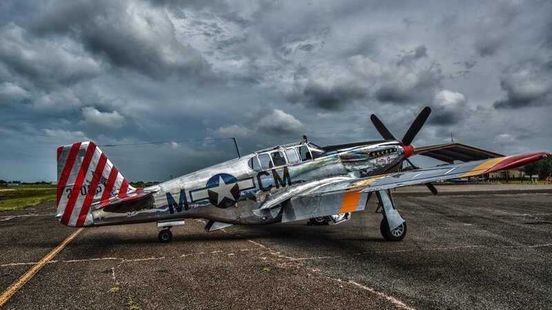 Silver Warplane on Tarmac — Gray