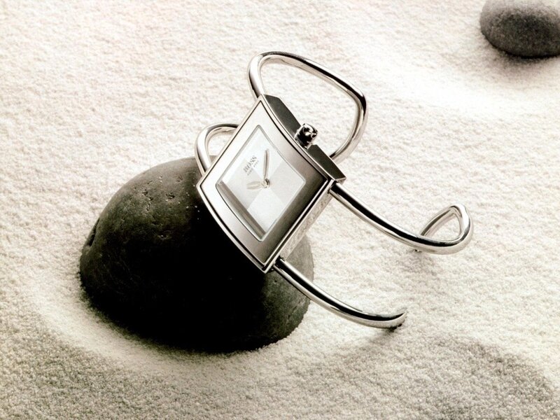 Silver watch on a stone