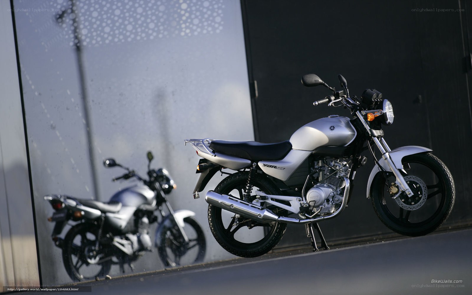 Silver Yamaha motorcycle on display