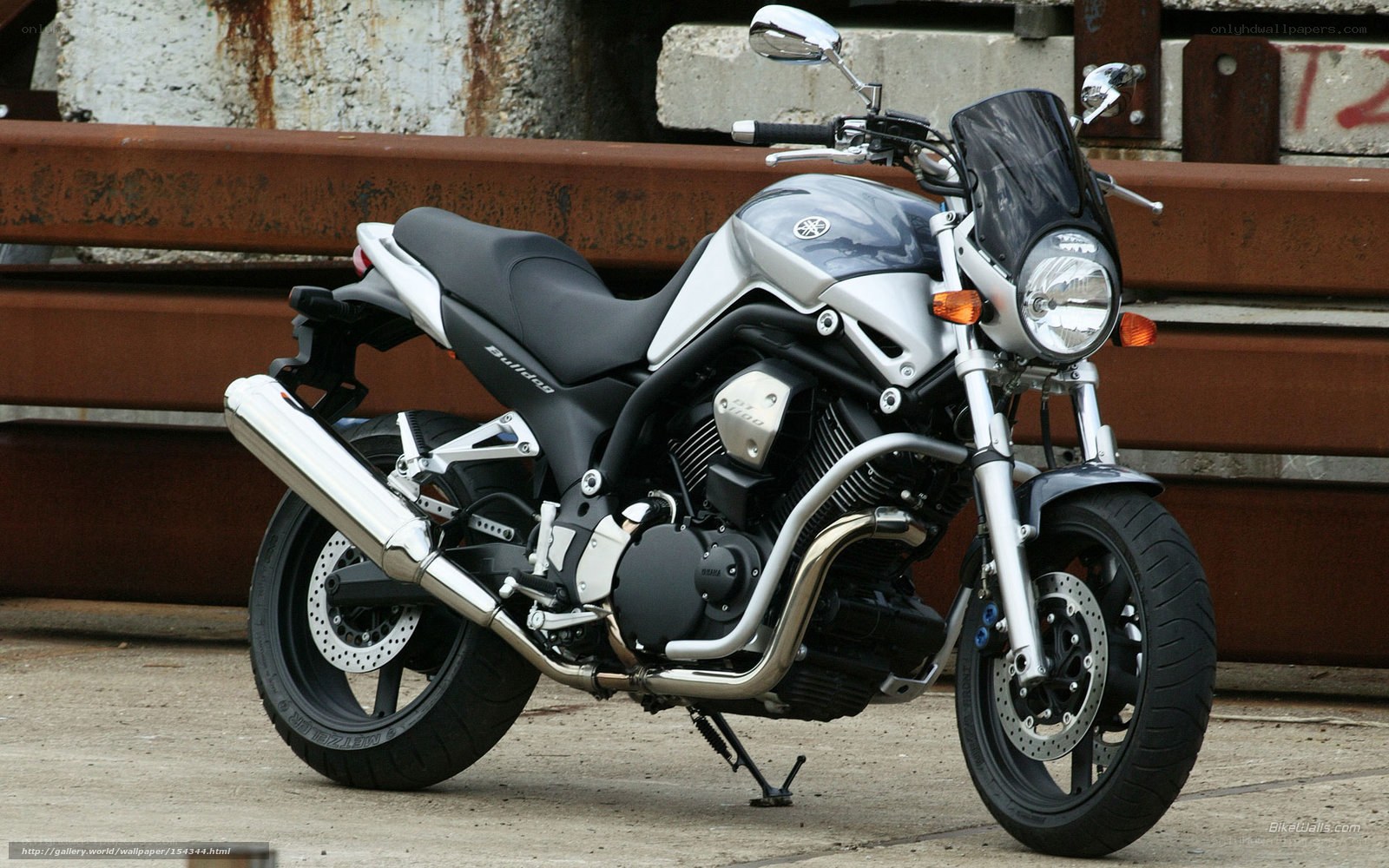 Silver Yamaha motorcycle parked