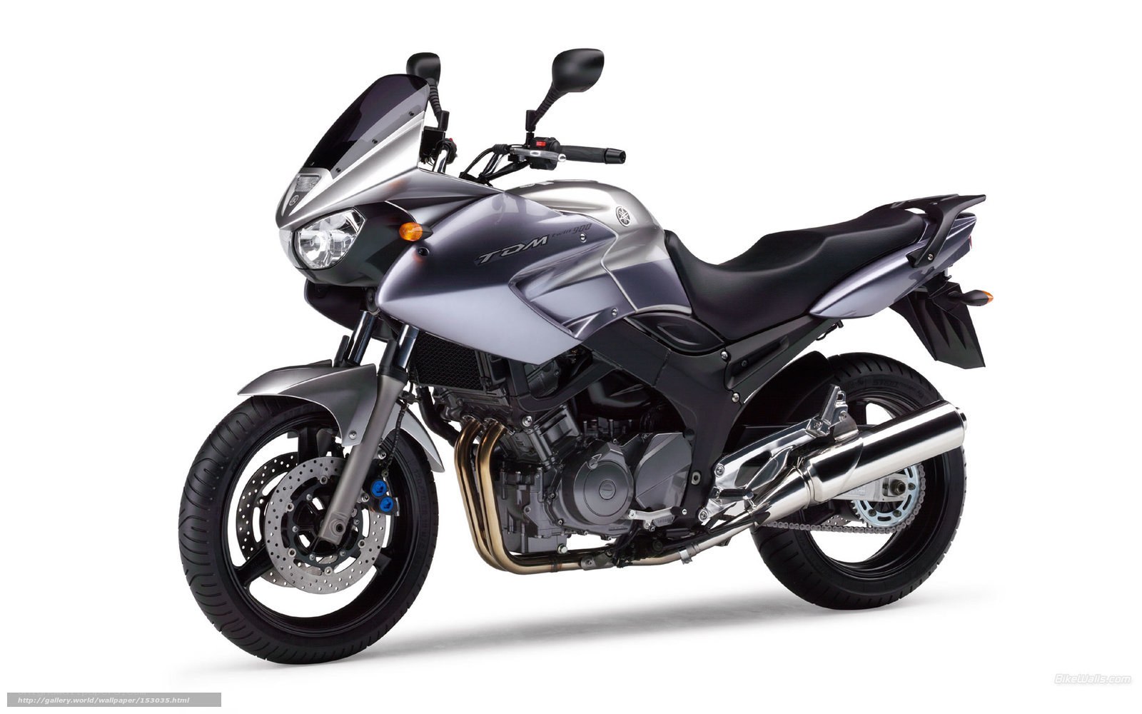 silver Yamaha TDM motorcycle