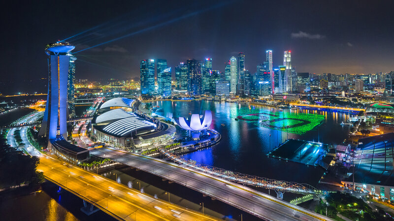 Singapore Skyline at Night — Blue, Dramatic, Photograph, Skyscrapers, Bridge, Light Show