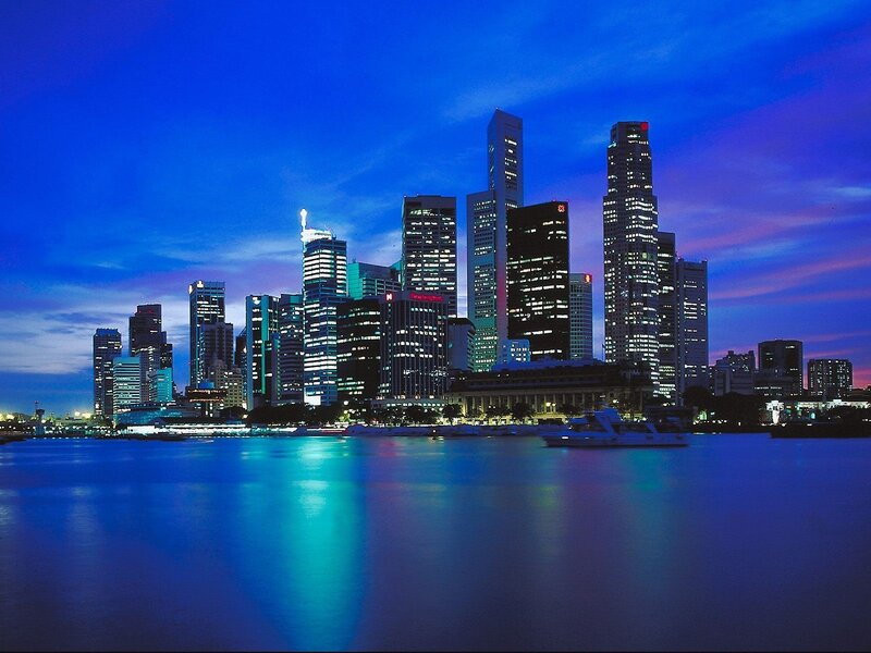 Singapore Skyline at Night — Blue, Dramatic, Photograph, Skyscrapers, River, Boat