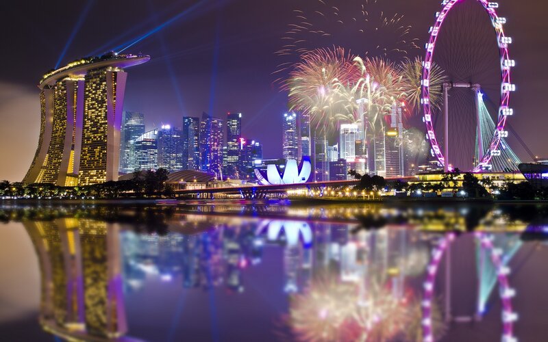 Singapore skyline at night with fireworks