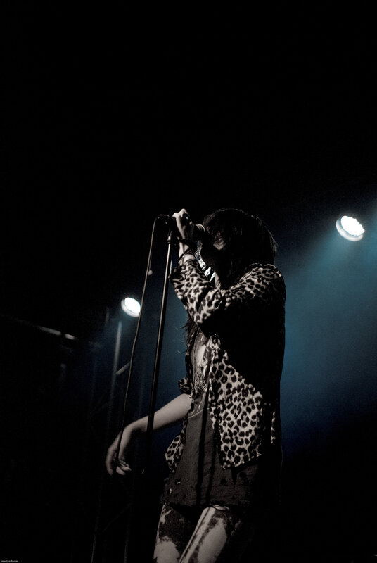 Singer on Stage — Black, Dramatic, Night