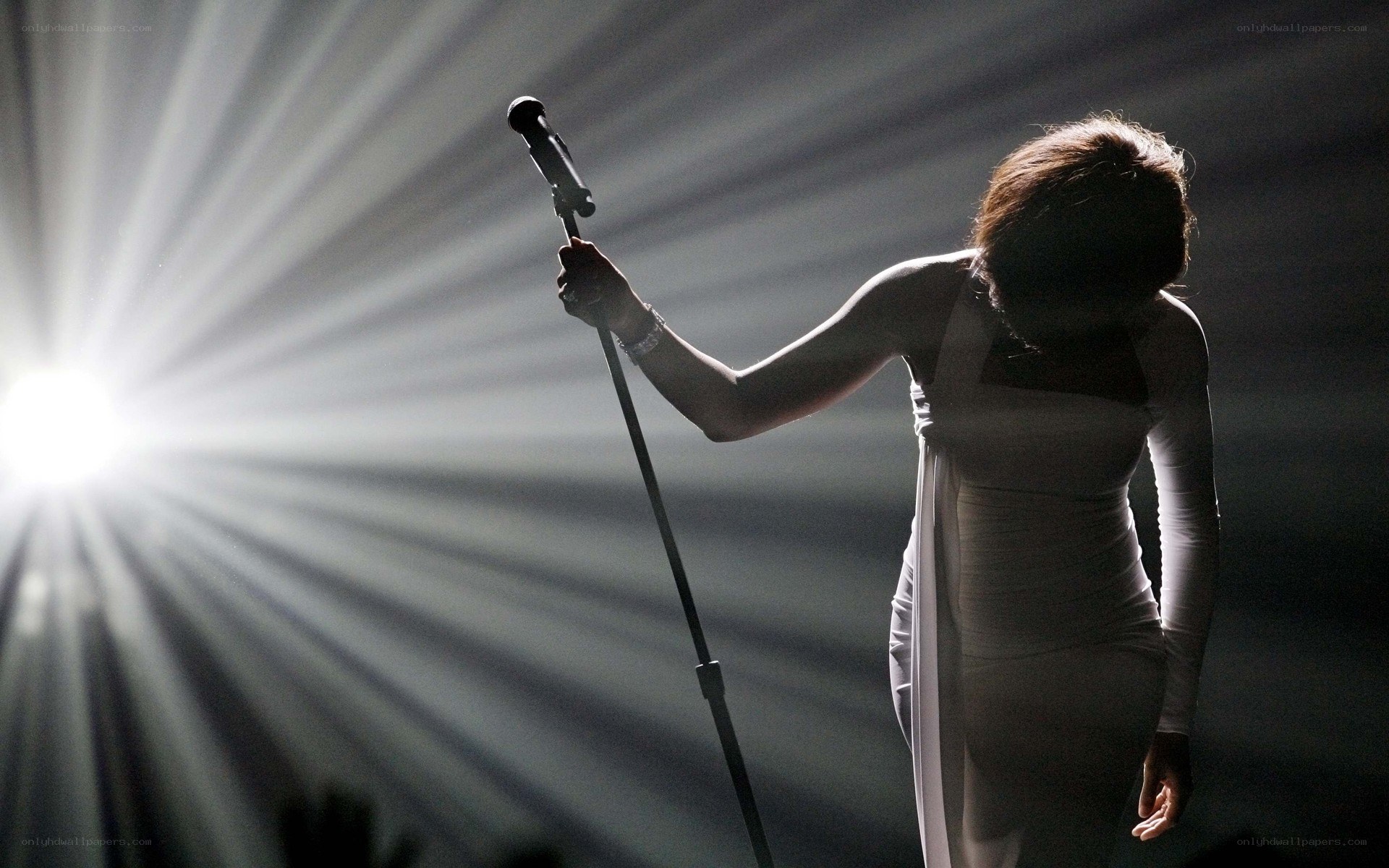 singer on stage with microphone