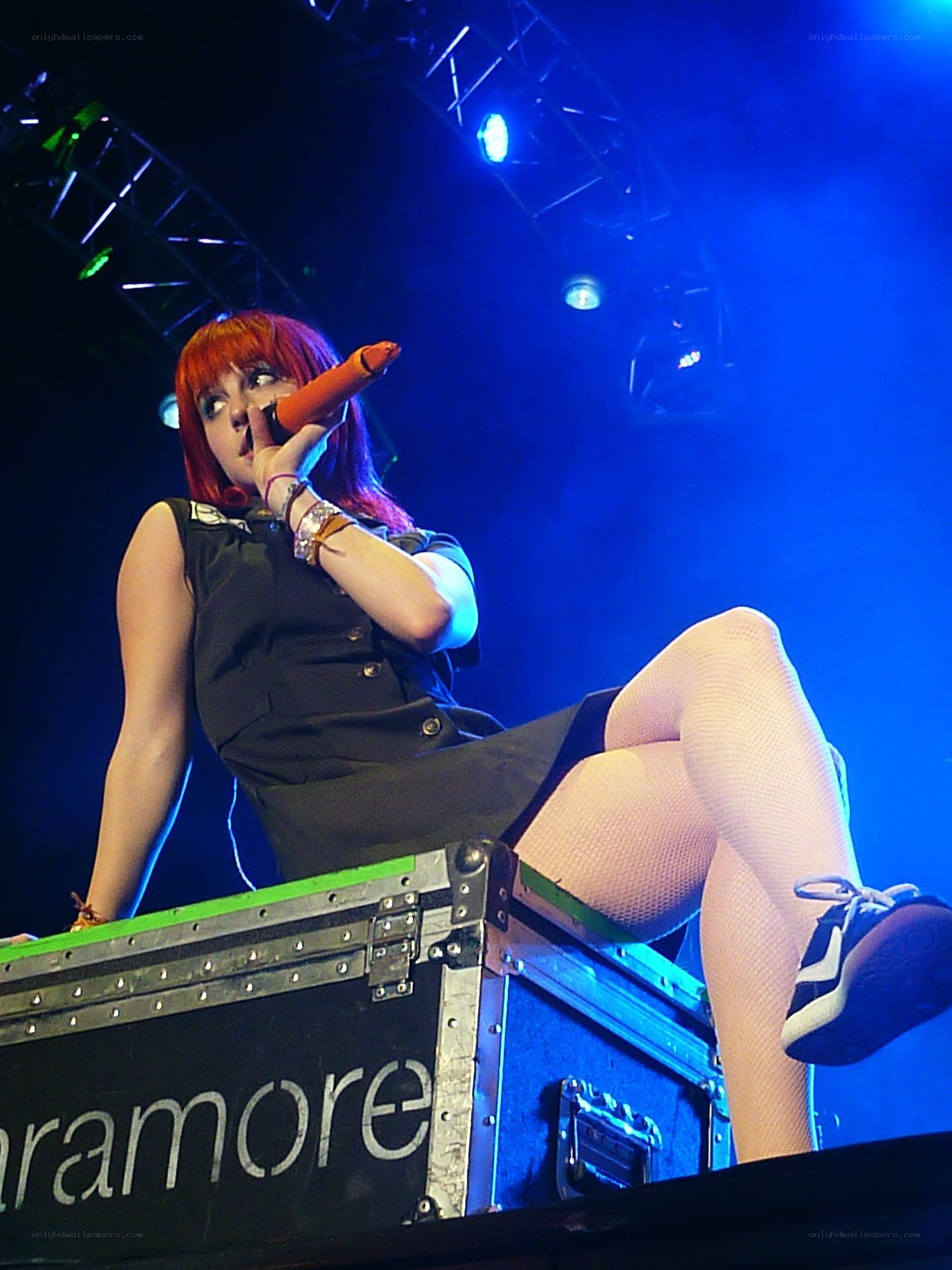 singer on stage with microphone