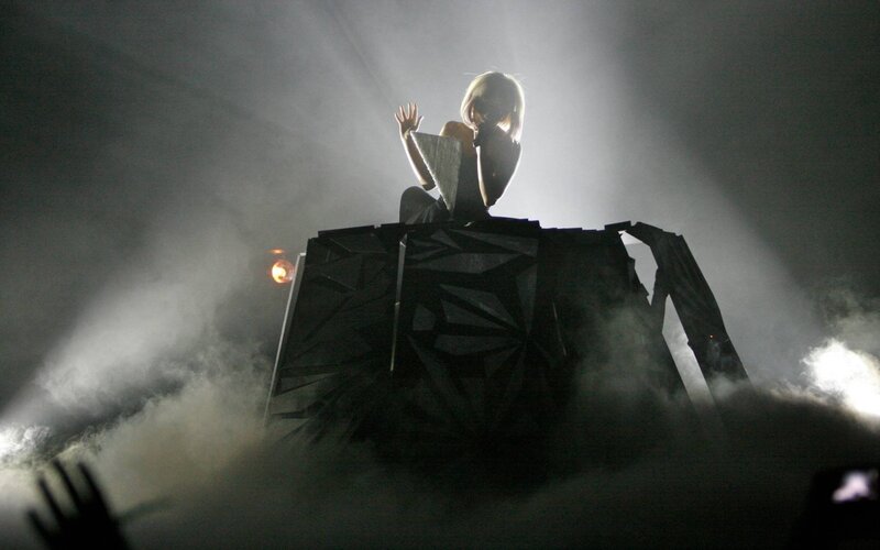 singer on stage with smoke