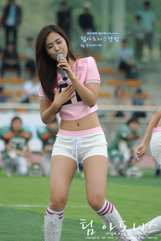 singer performing at a stadium