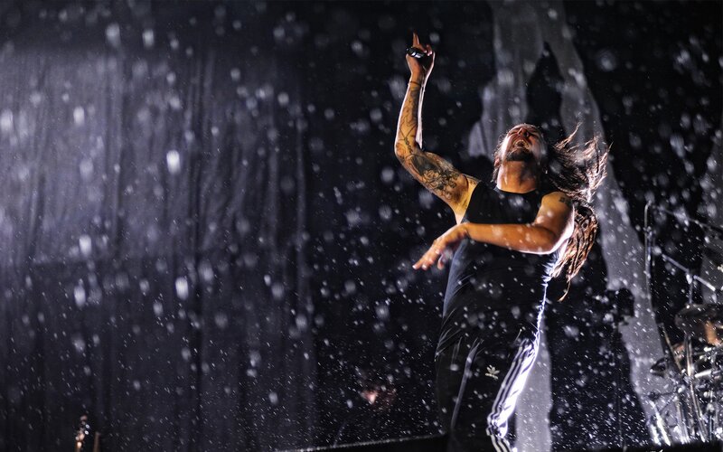 Singer performing in rain
