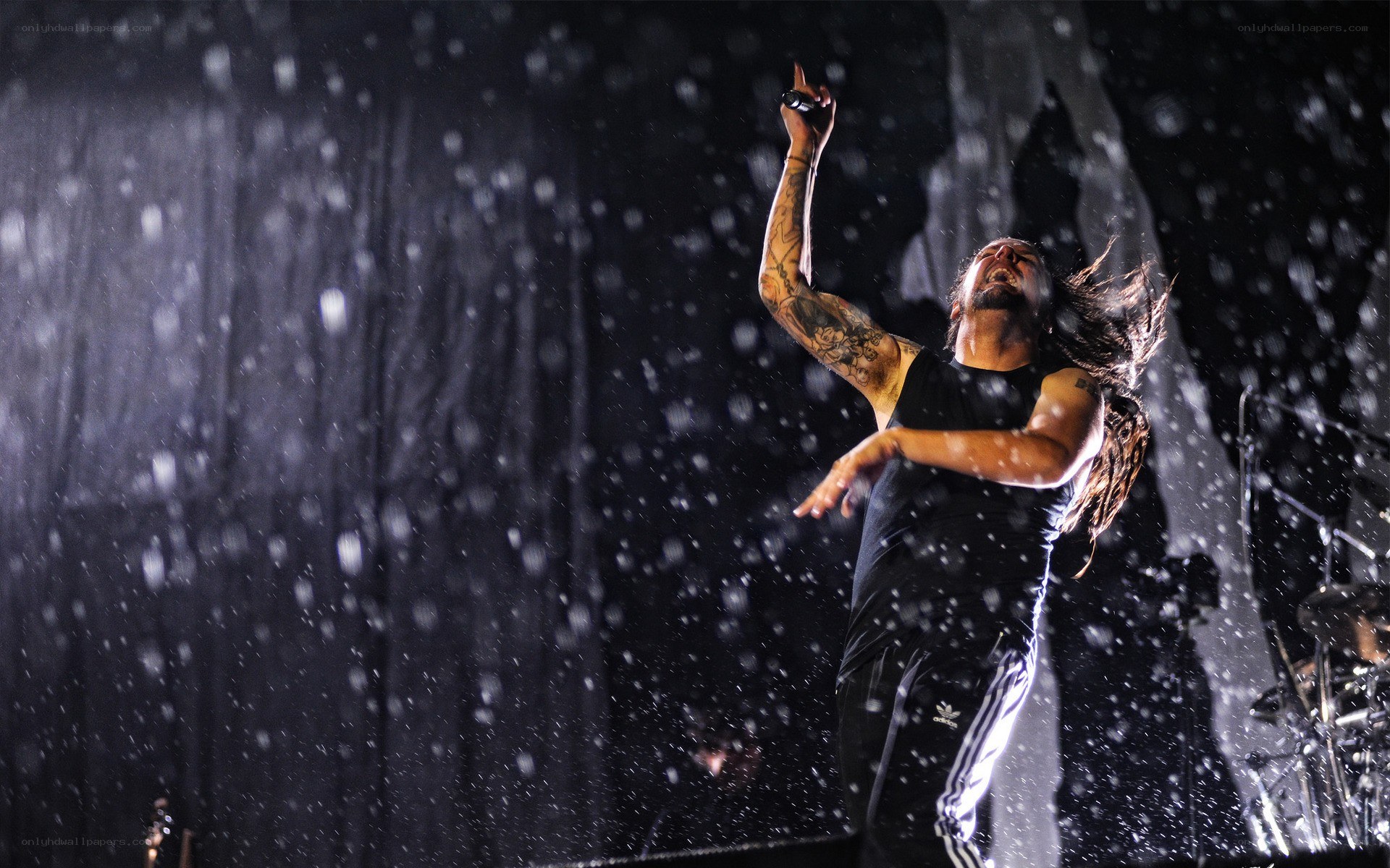 Singer performing in rain