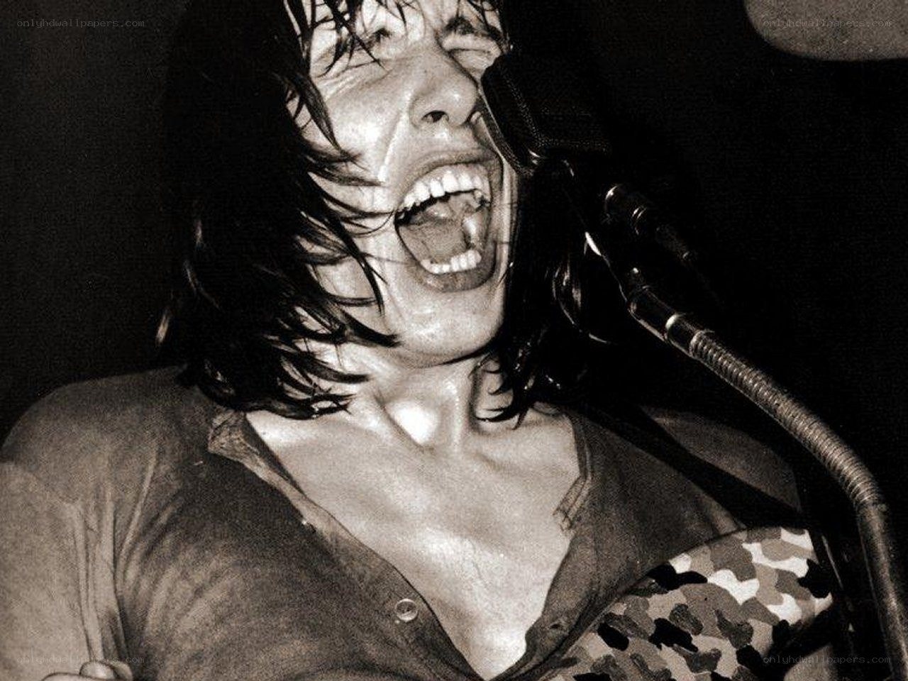 singer performing on stage
