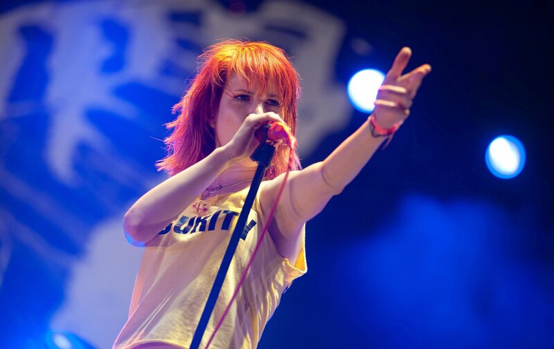 singer performing on stage