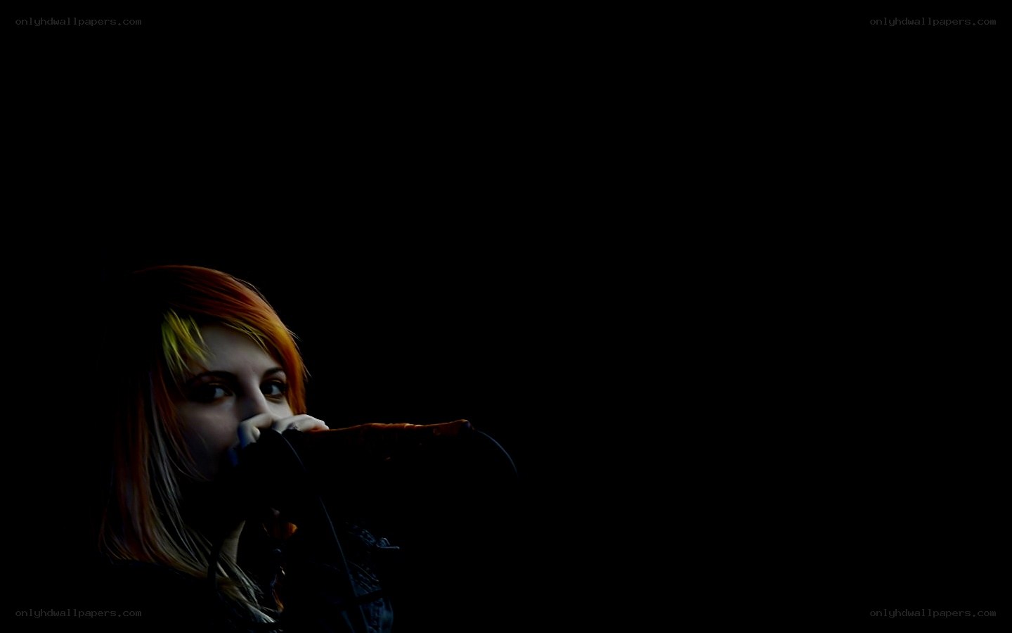 singer performing on stage