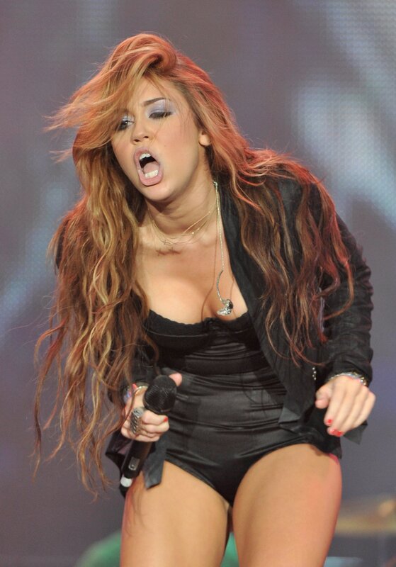 singer performing on stage
