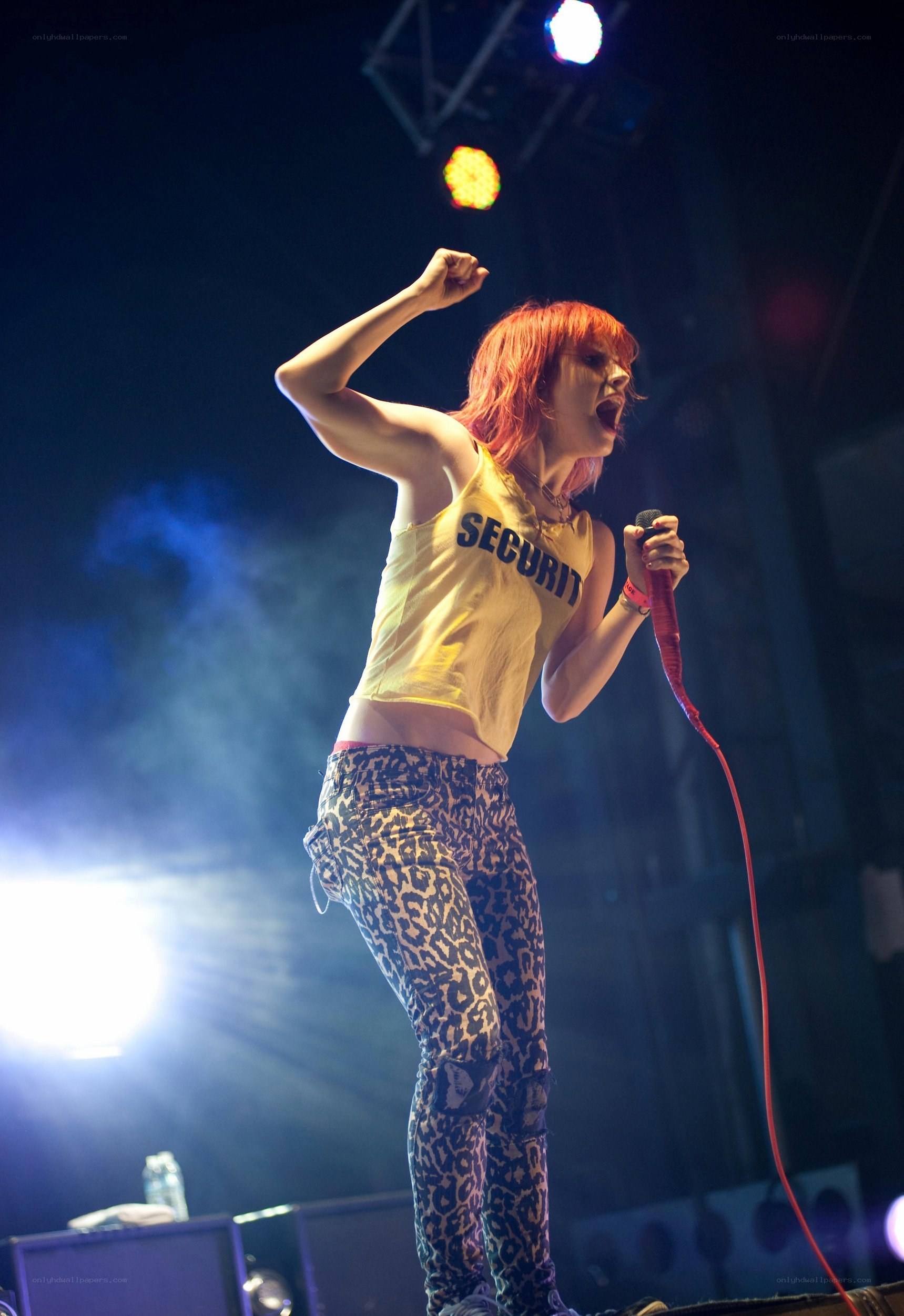 singer performing on stage