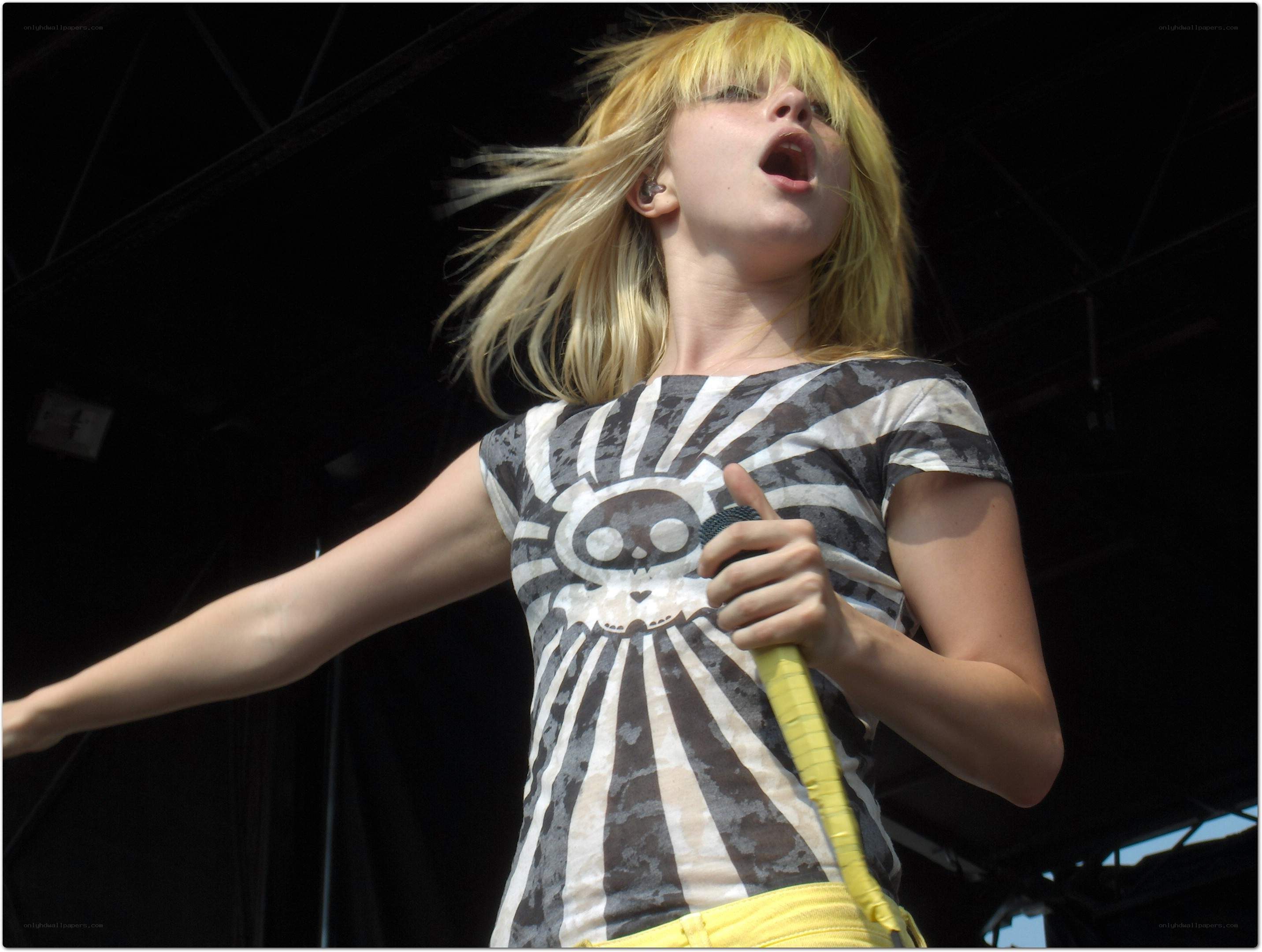 singer performing on stage