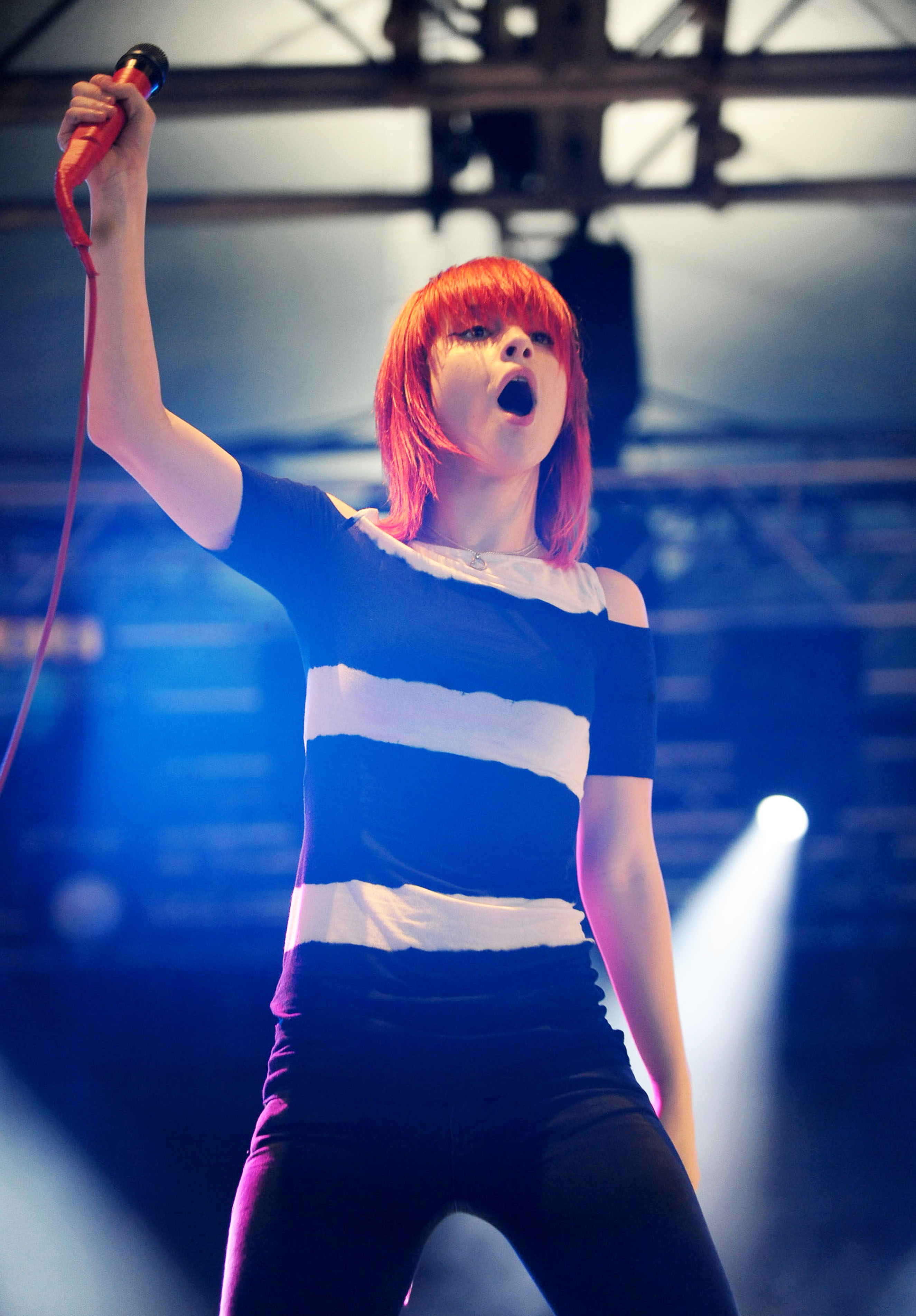 singer performing on stage