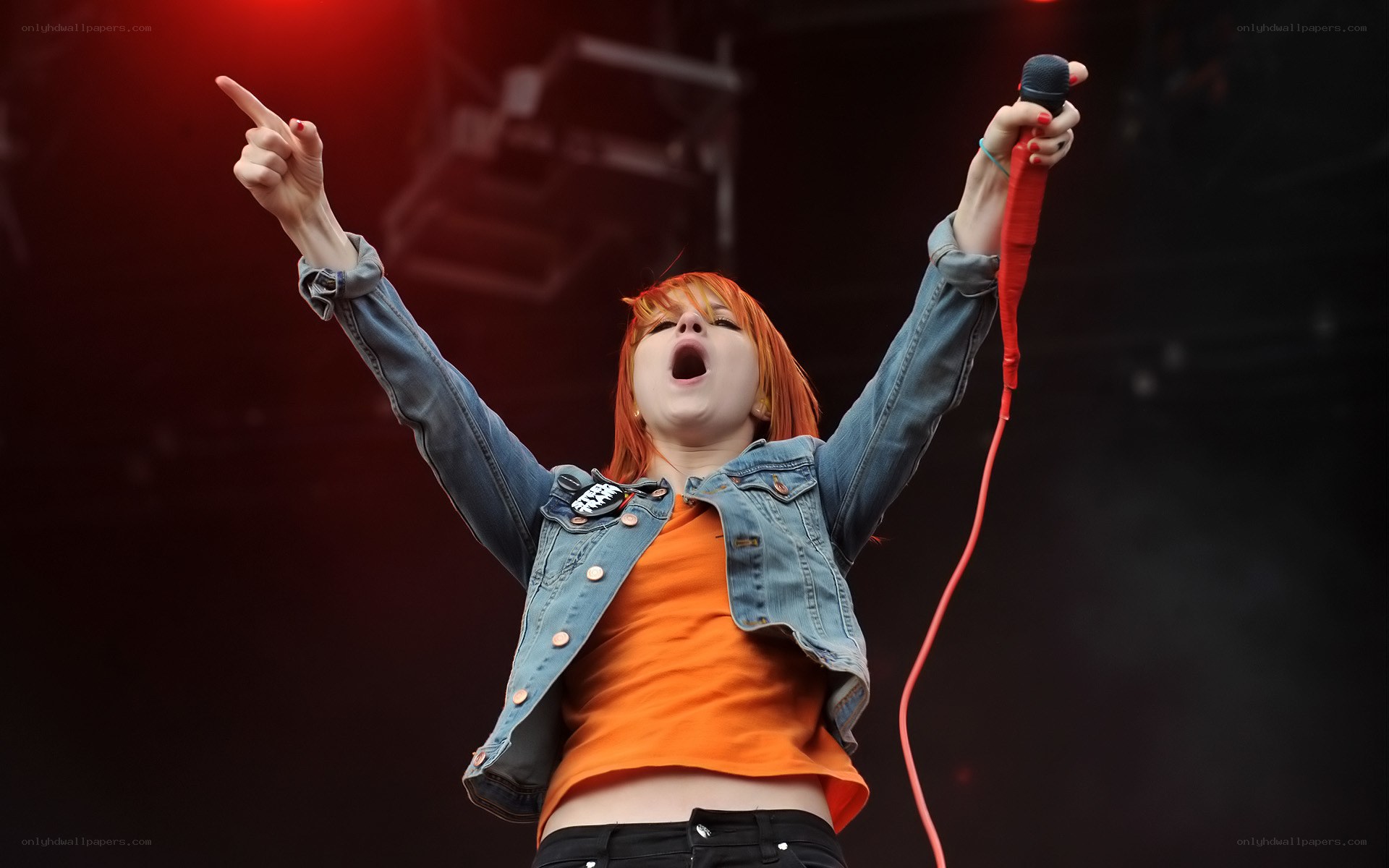 singer performing on stage