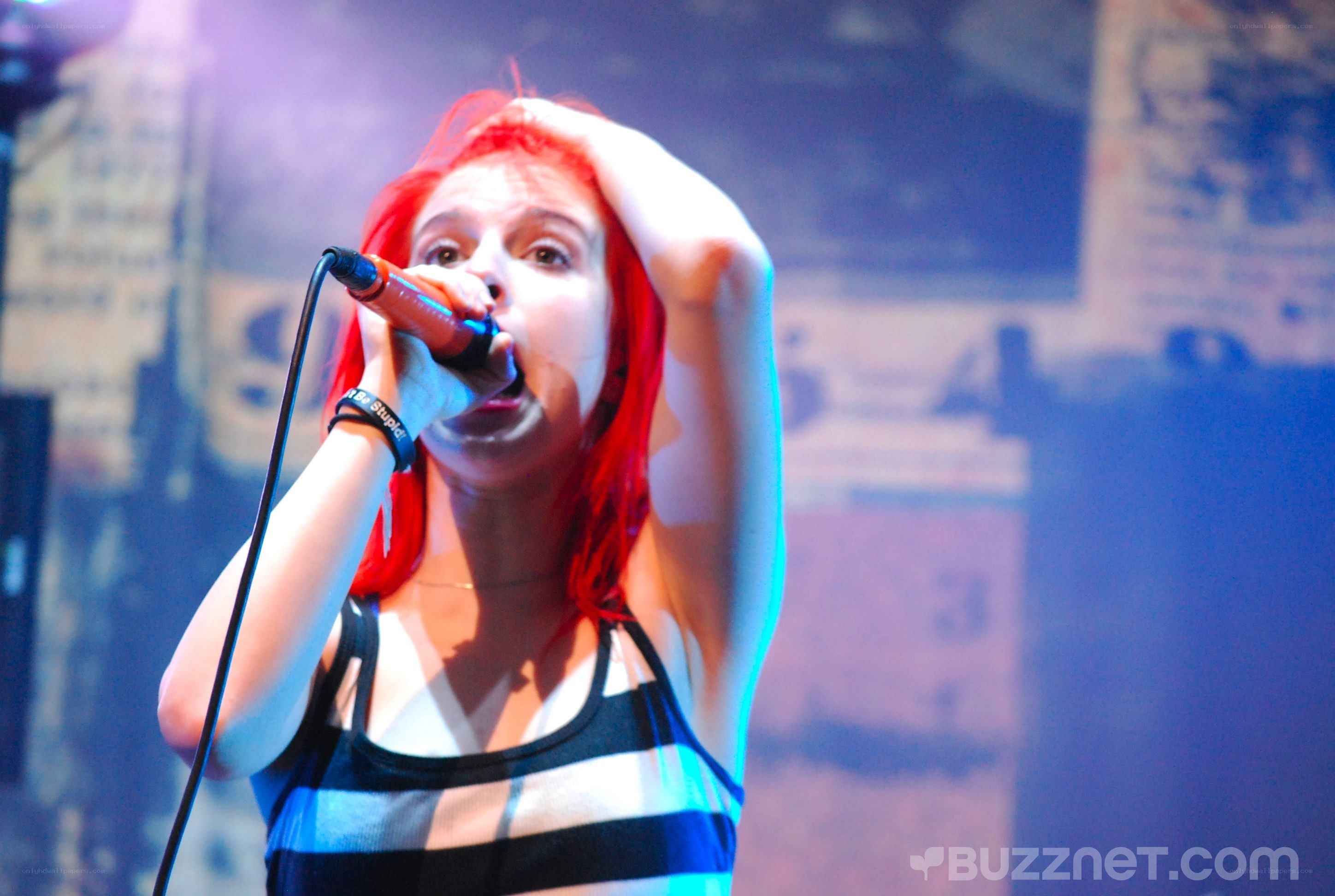 singer performing on stage