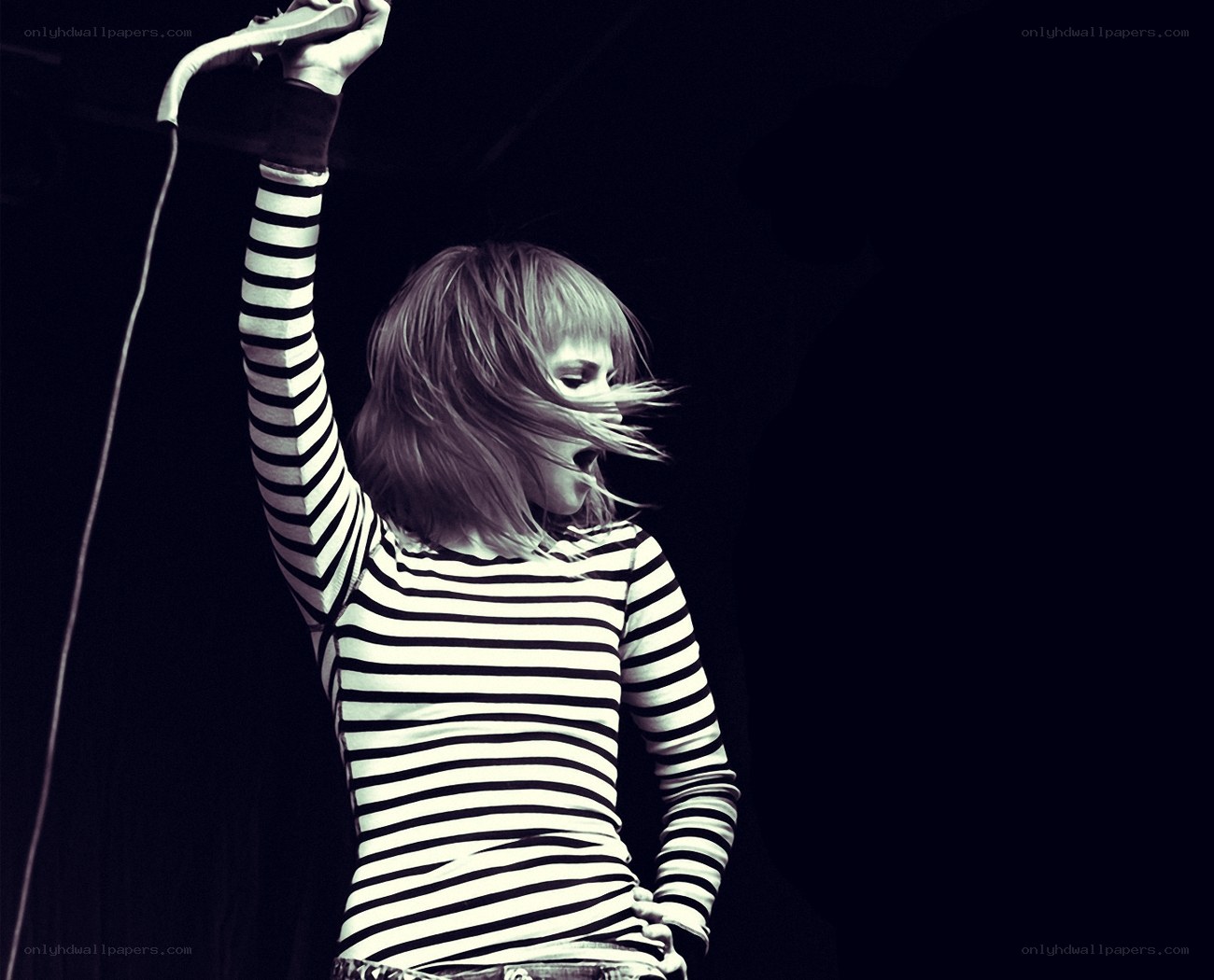 singer performing on stage
