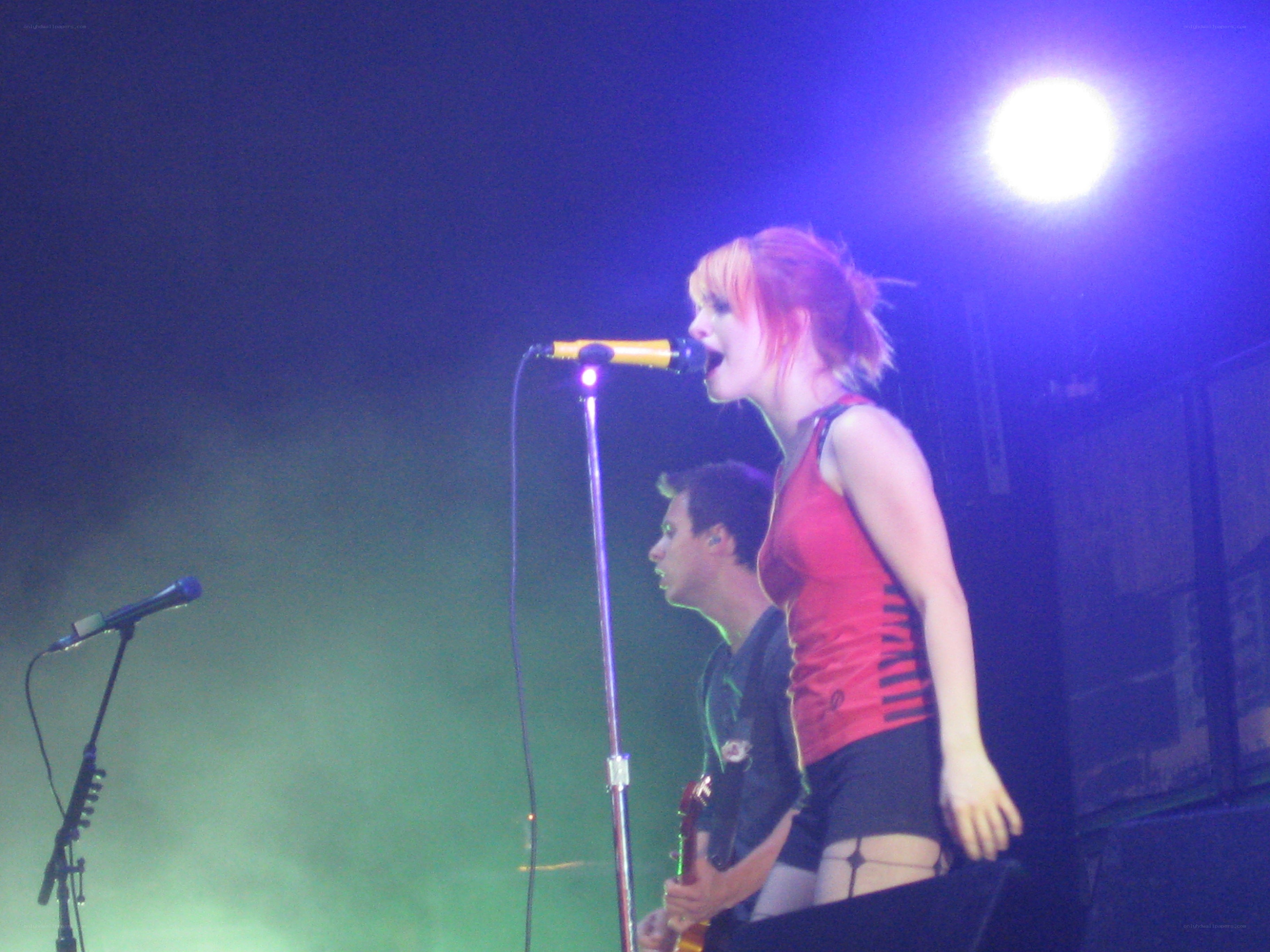 singer performing on stage