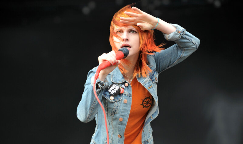 singer performing on stage