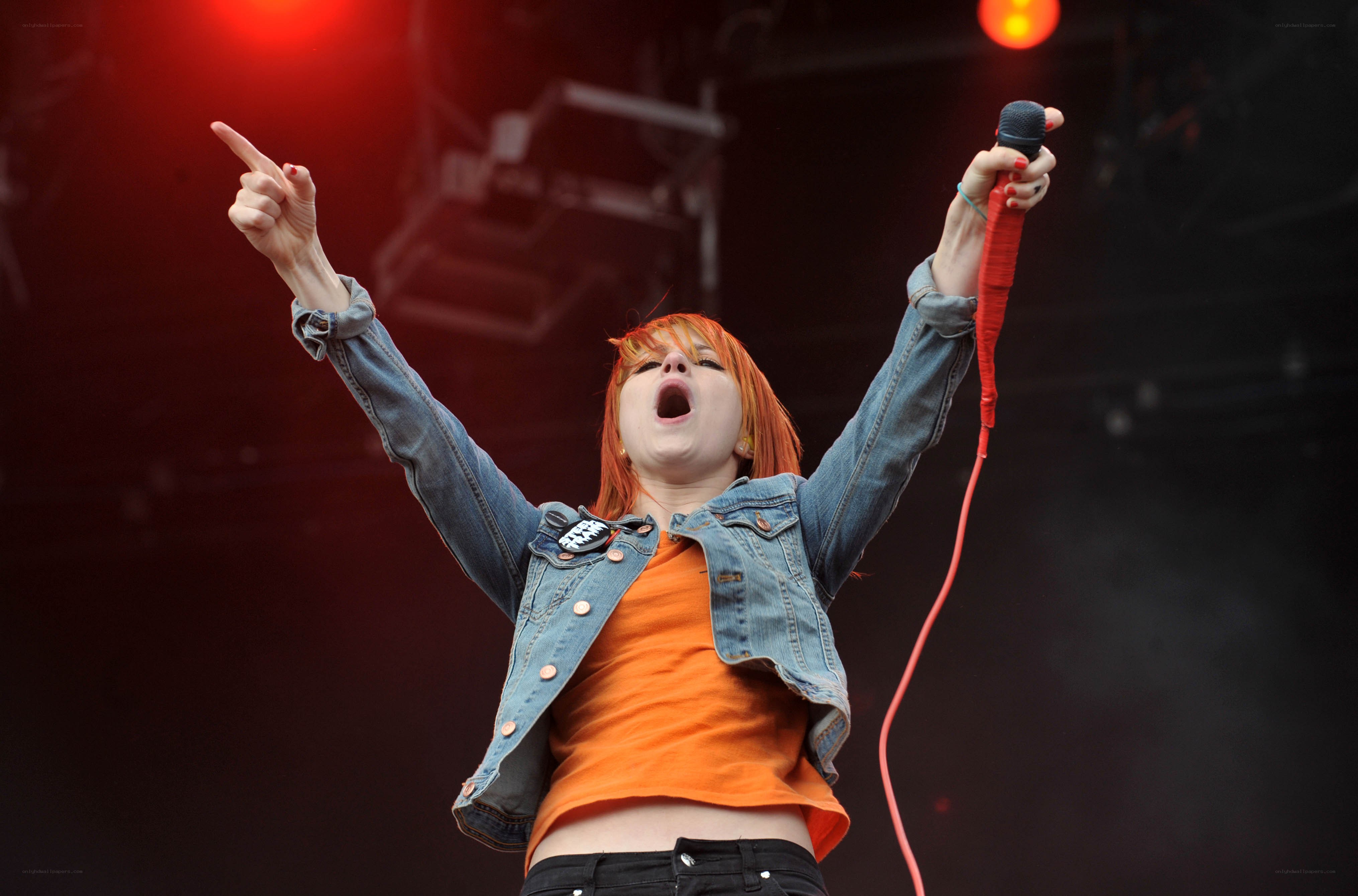 singer performing on stage