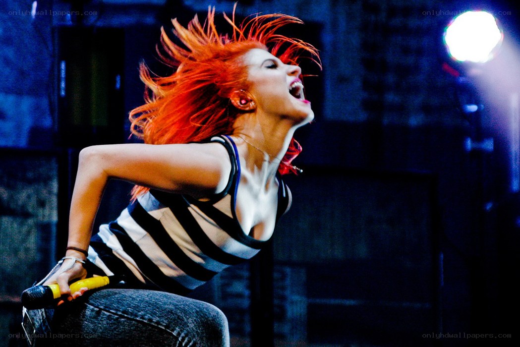singer performing on stage