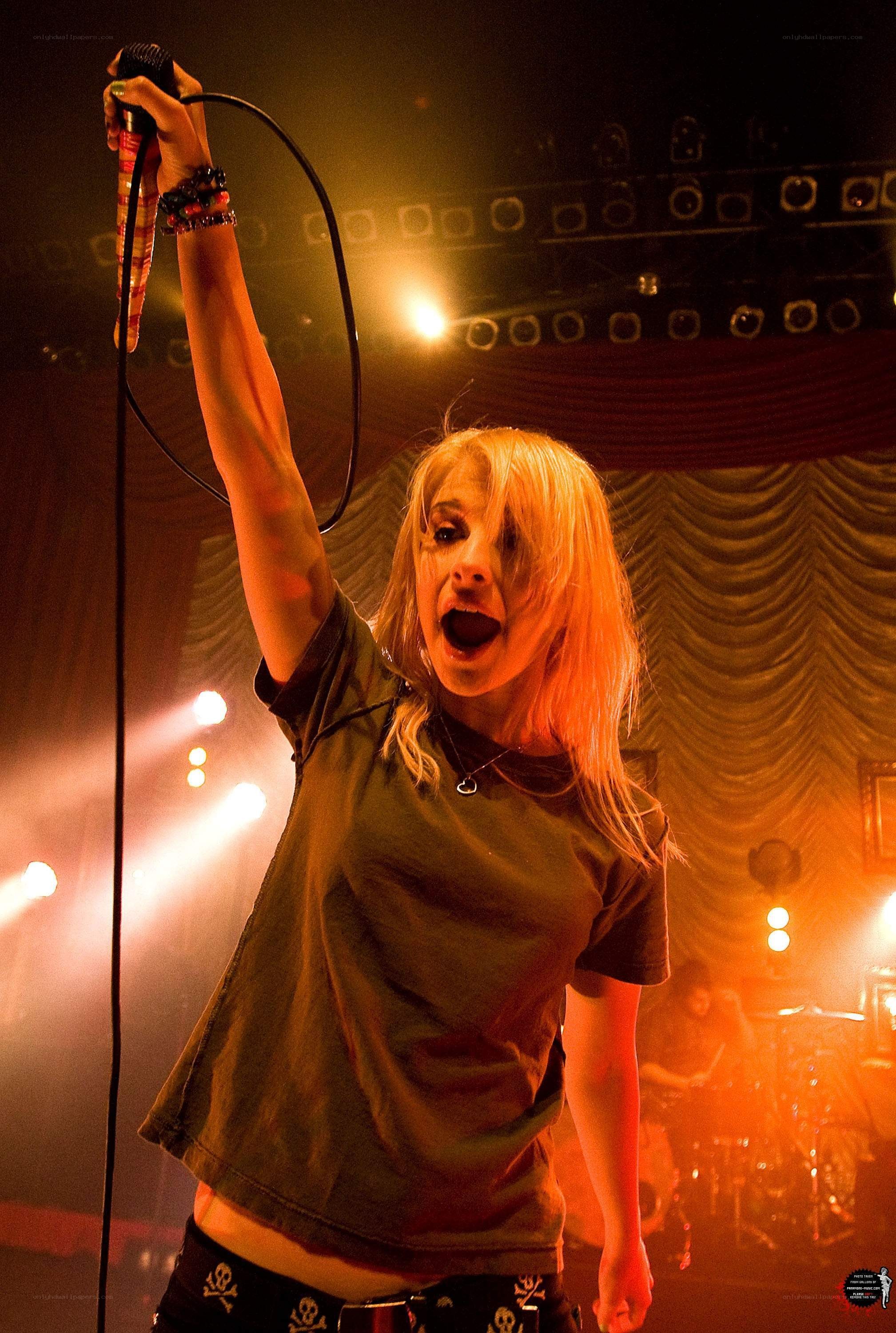 singer performing on stage